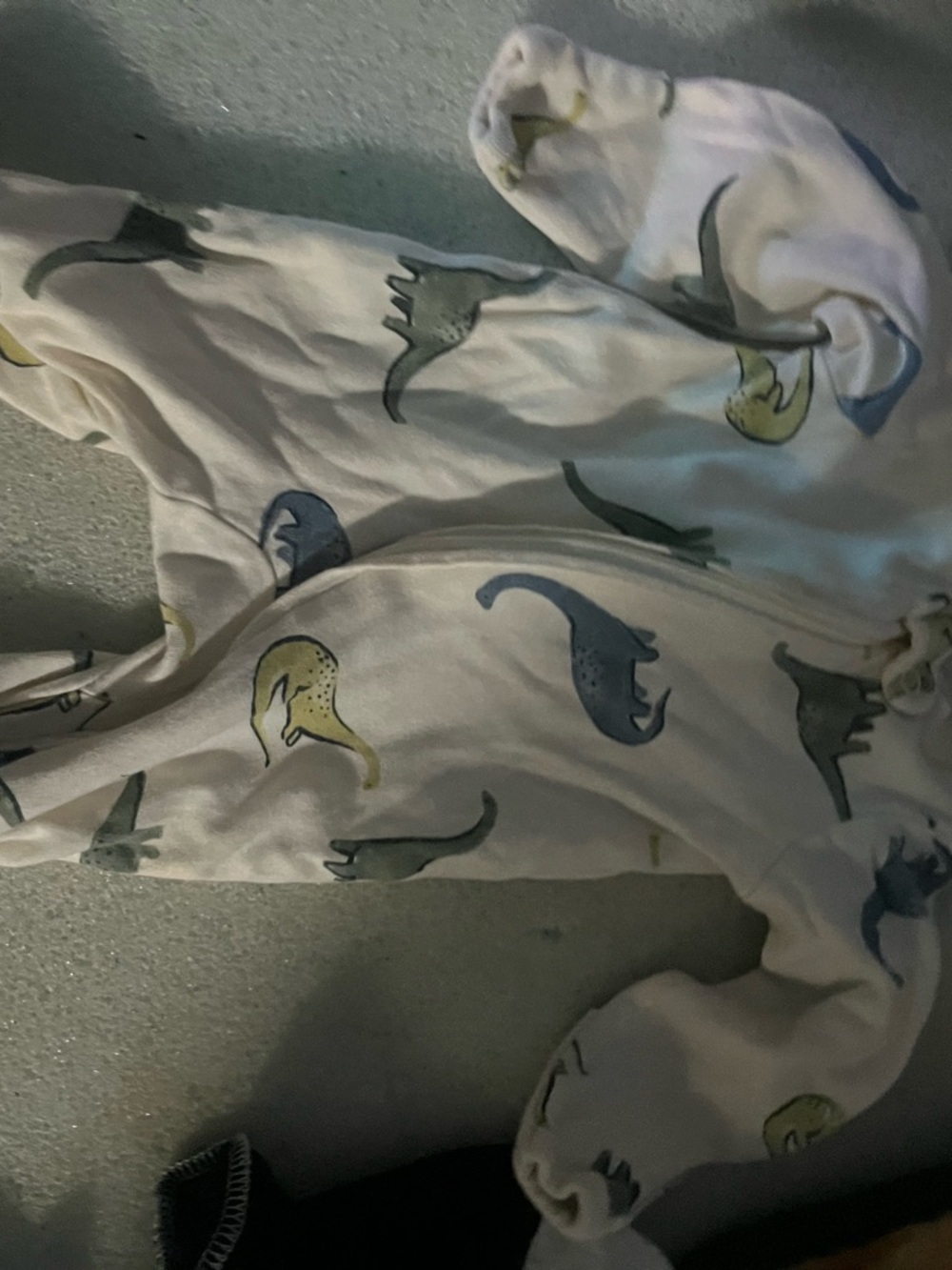 Gerber White Footed One-Piece with Blue, Green, and Yellow Dinosaur Print
